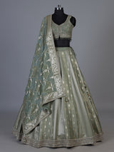Pista green jacquard brocade lehenga choli with ornate detailing