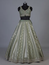 Pista green jacquard brocade lehenga choli with ornate detailing