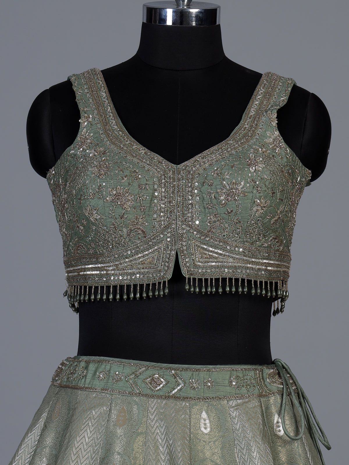 Pista green jacquard brocade lehenga choli with ornate detailing