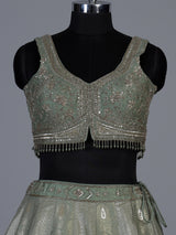Pista green jacquard brocade lehenga choli with ornate detailing
