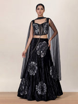 Black velvet lehenga choli with cutdana and pearl embellishments