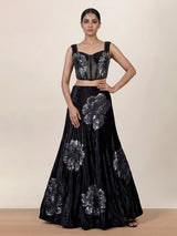 Black velvet lehenga choli with cutdana and pearl embellishments
