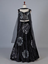 Black velvet lehenga choli with cutdana and pearl embellishments