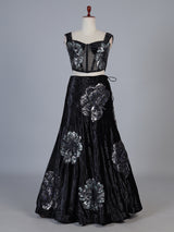 Black velvet lehenga choli with cutdana and pearl embellishments