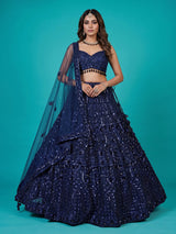 Blue net lehenga choli with intricate pearl cutdana embellishments