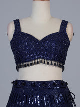 Blue net lehenga choli with intricate pearl cutdana embellishments