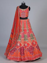 Orange art silk lehenga choli with elephant motif embellishments