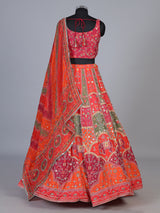 Orange art silk lehenga choli with elephant motif embellishments