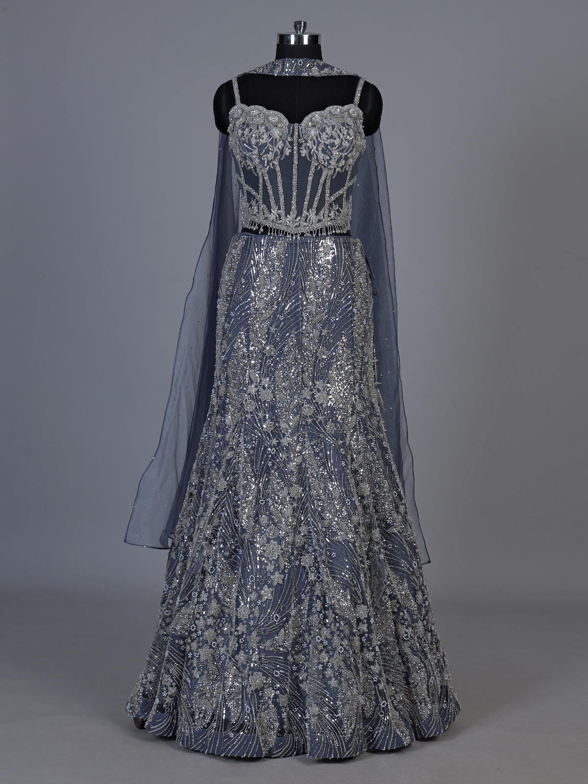 Stone grey net lehenga choli with zardosi stone embellishments