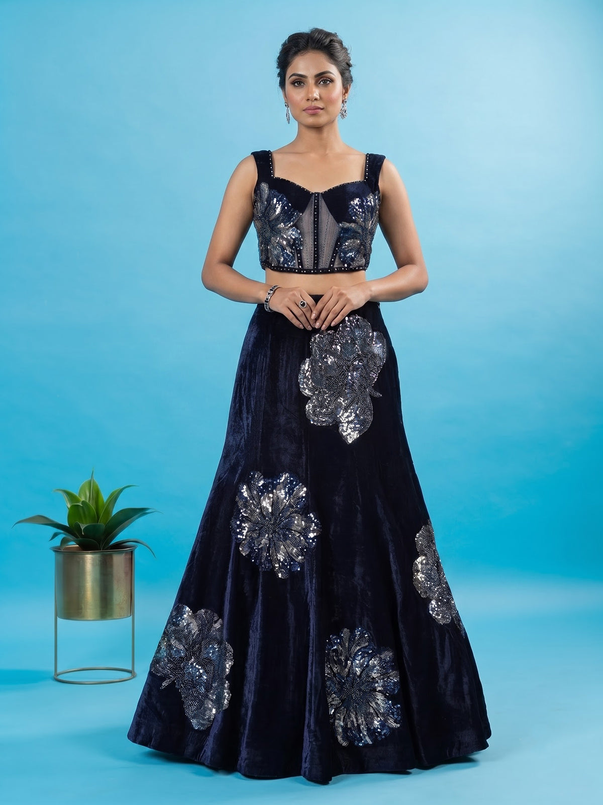 Blue velvet lehenga choli with cutdana and pearl embellishments