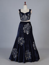 Blue velvet lehenga choli with cutdana and pearl embellishments
