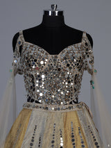 Golden tissue blend lehenga choli with mirror cutdana embellishments