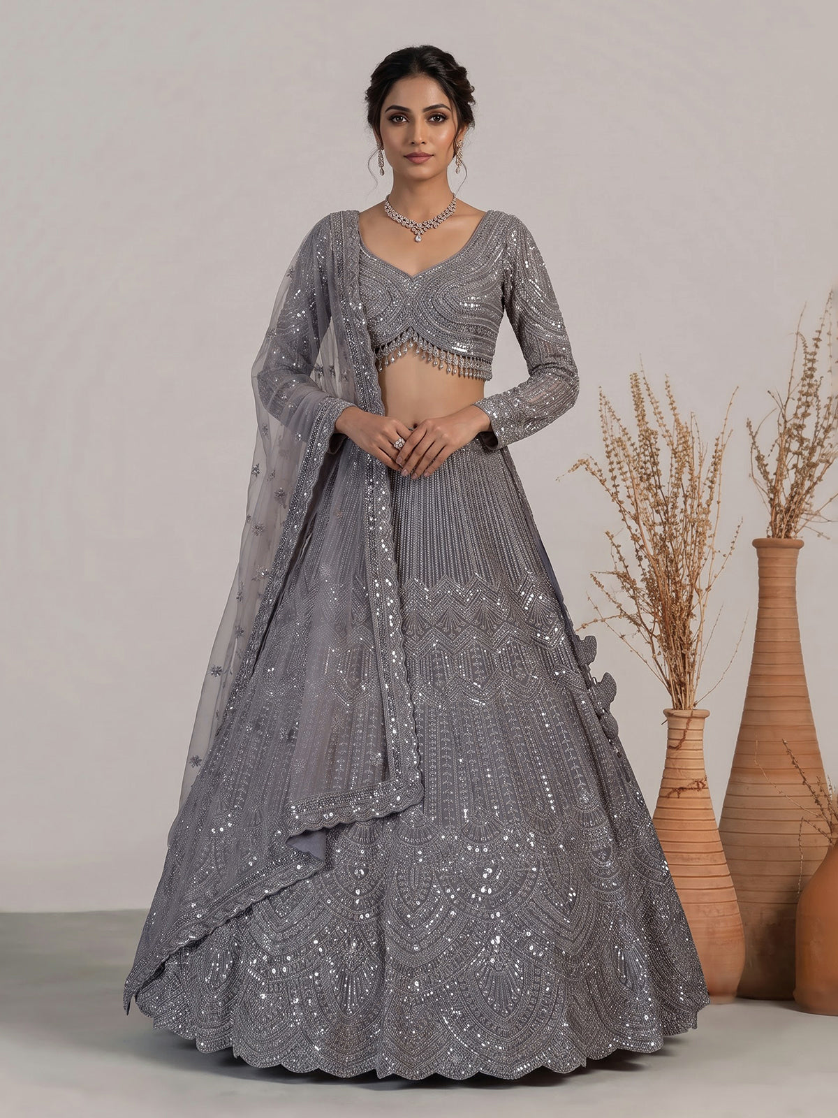 Lavender purple net lehenga choli with sparkling diamond tassel detailing