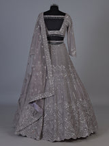 Lavender purple net lehenga choli with sparkling diamond tassel detailing