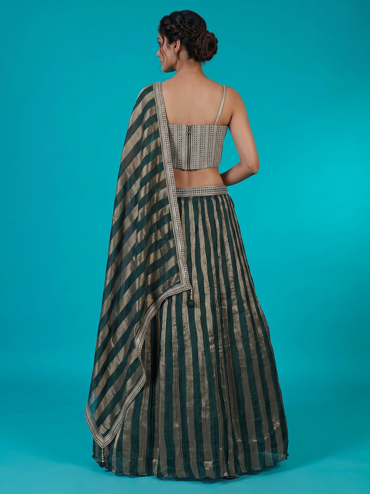 Green crushed tissue blend lehenga choli with elegant resham zari work
