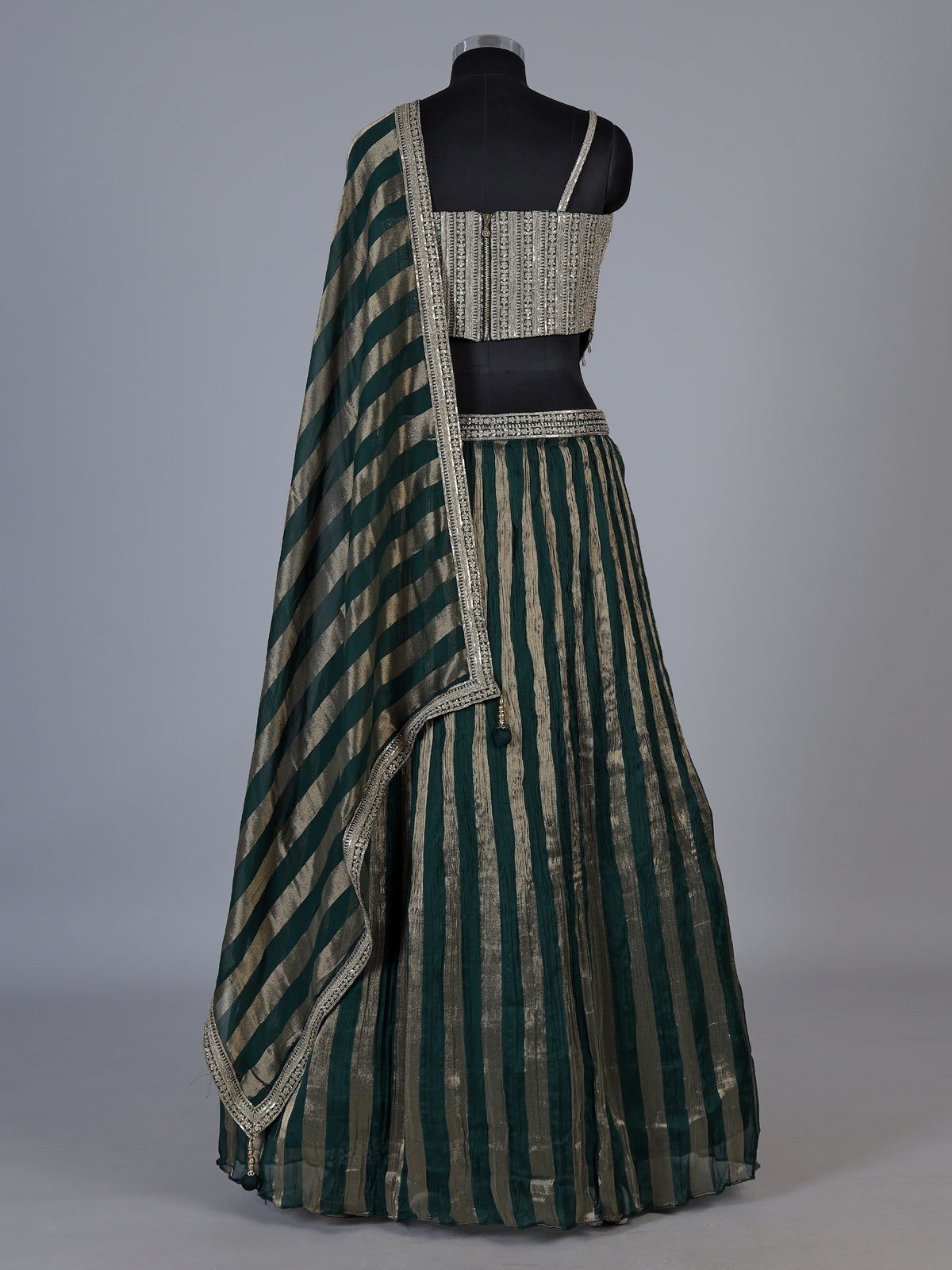Green crushed tissue blend lehenga choli with elegant resham zari work