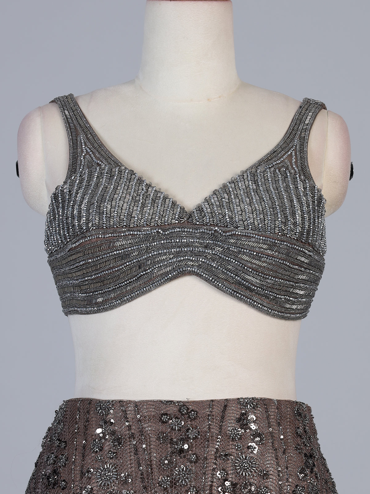 Mauve brown designer net lehenga choli with heavy embellishments
