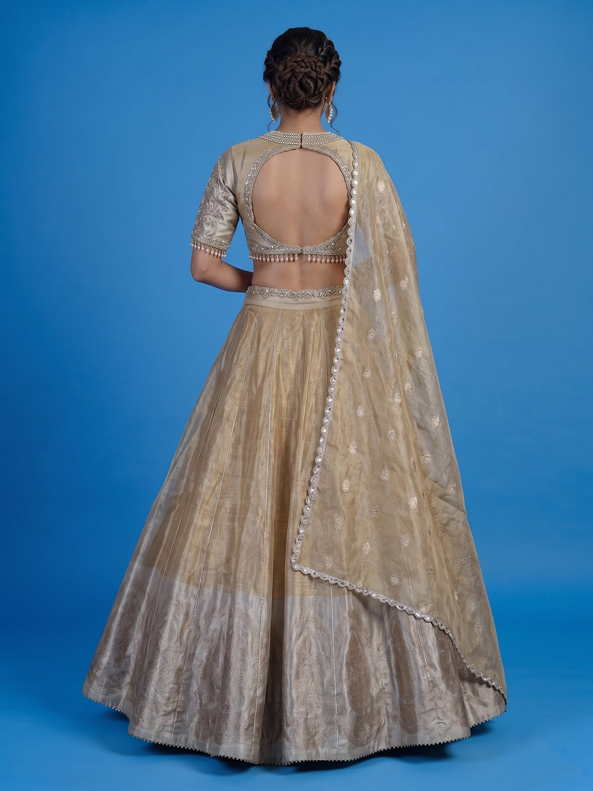 Golden silk lehenga choli with zardosi gota and zari embellishments