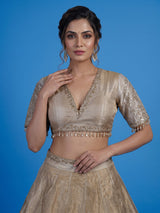 Golden silk lehenga choli with zardosi gota and zari embellishments