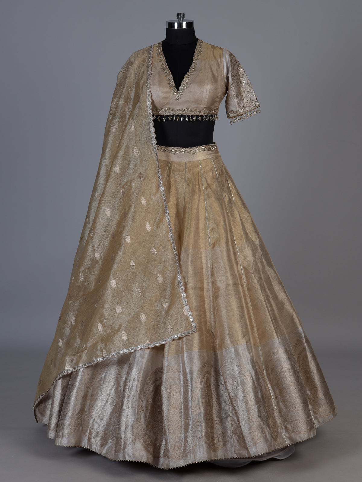 Golden silk lehenga choli with zardosi gota and zari embellishments