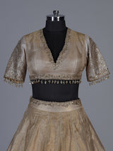 Golden silk lehenga choli with zardosi gota and zari embellishments