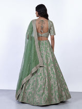 Pista green silk lehenga choli with resham floral embellishments