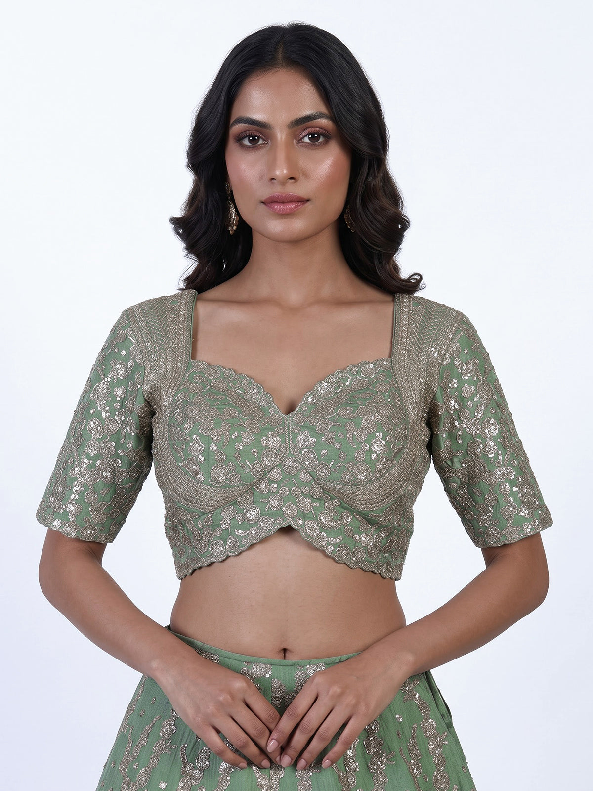 Pista green silk lehenga choli with resham floral embellishments