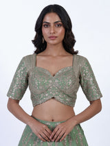 Pista green silk lehenga choli with resham floral embellishments