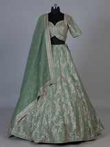 Pista green silk lehenga choli with resham floral embellishments