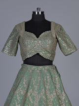 Pista green silk lehenga choli with resham floral embellishments