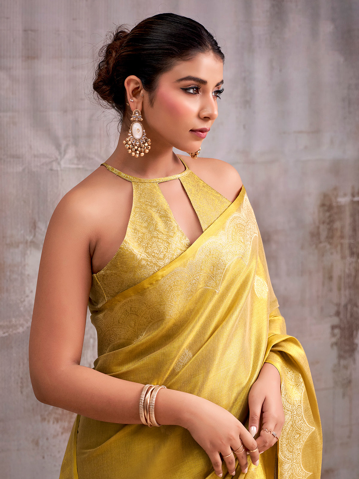 Yellow radiant designer tissue silk saree women