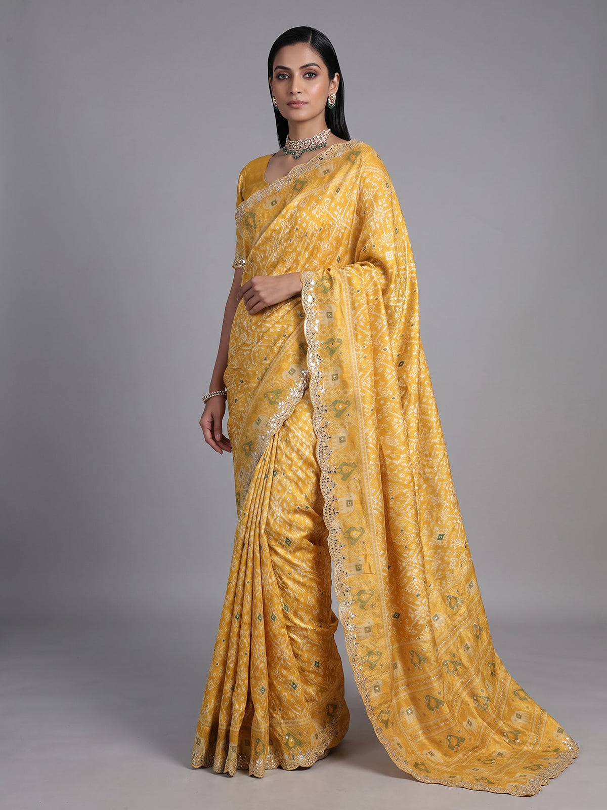 Mustard yellow soft silk saree with vibrant patola printed elegance