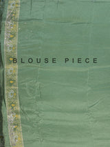 Pista green soft silk saree with charming patola printed artistry