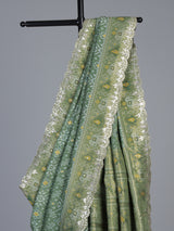 Pista green soft silk saree with charming patola printed artistry