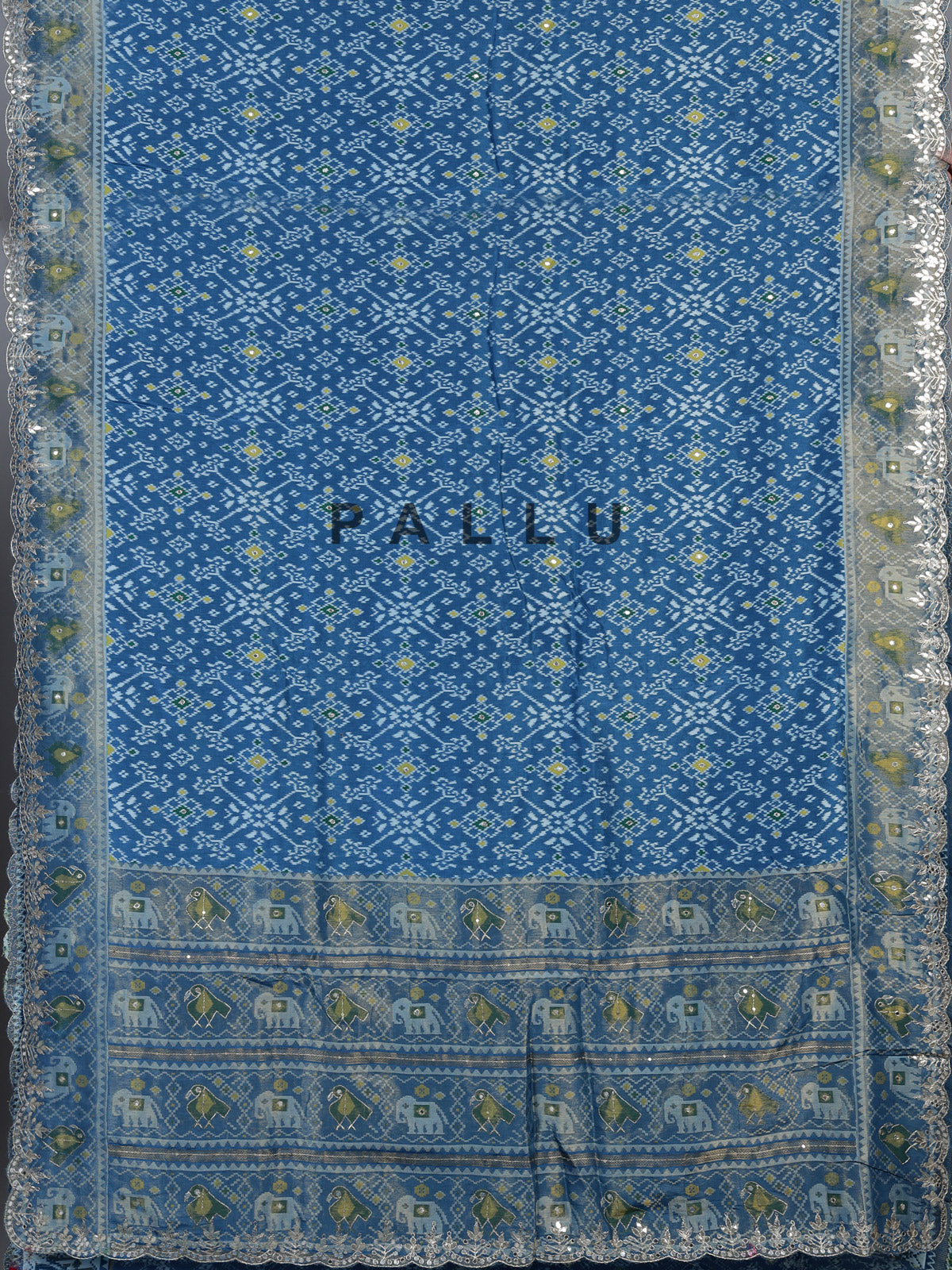 Blue soft silk saree with beautiful patola printed detailing