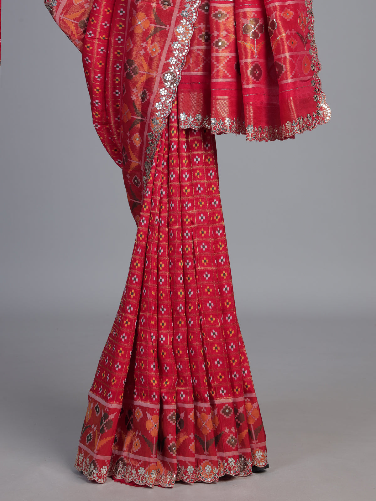 Red soft silk saree with traditional ikat printed zari elegance