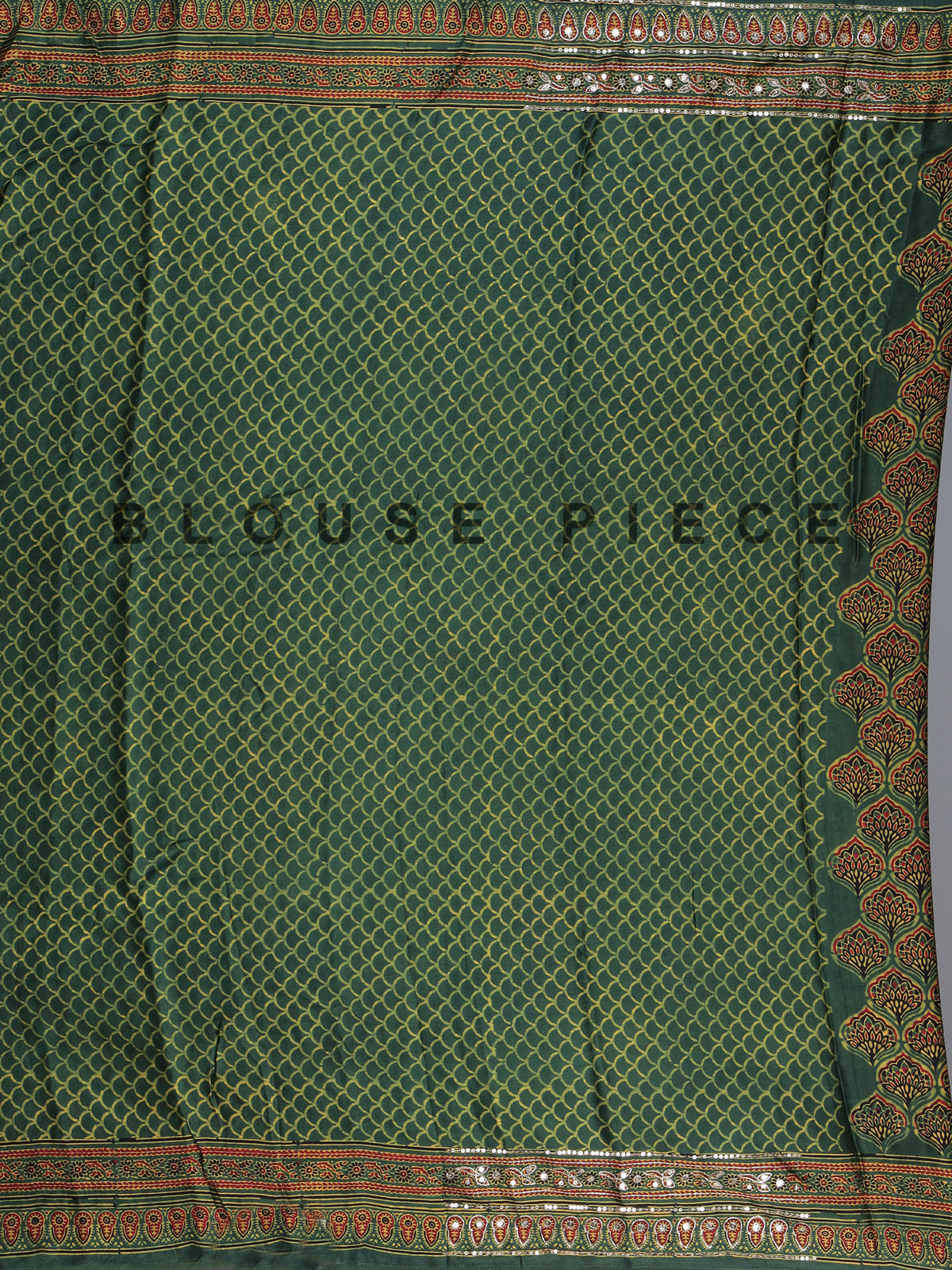 Green crepe silk saree with graceful printed festive detailing