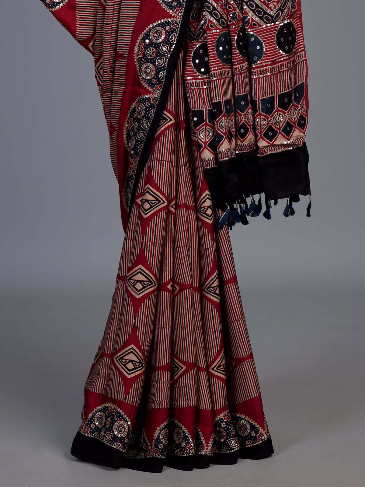 Maroon crepe silk saree with elegant sequin printed artistry