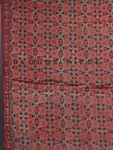 Red crepe silk saree with shimmering mirror printed accents