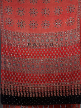 Red crepe silk saree with shimmering mirror printed accents