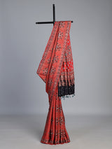Red crepe silk saree with shimmering mirror printed accents