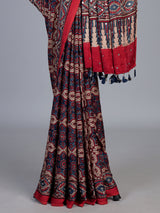 Maroon crepe silk saree with mirror and sequin embellishments