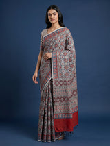 White crepe silk saree with delicate printed festive charm
