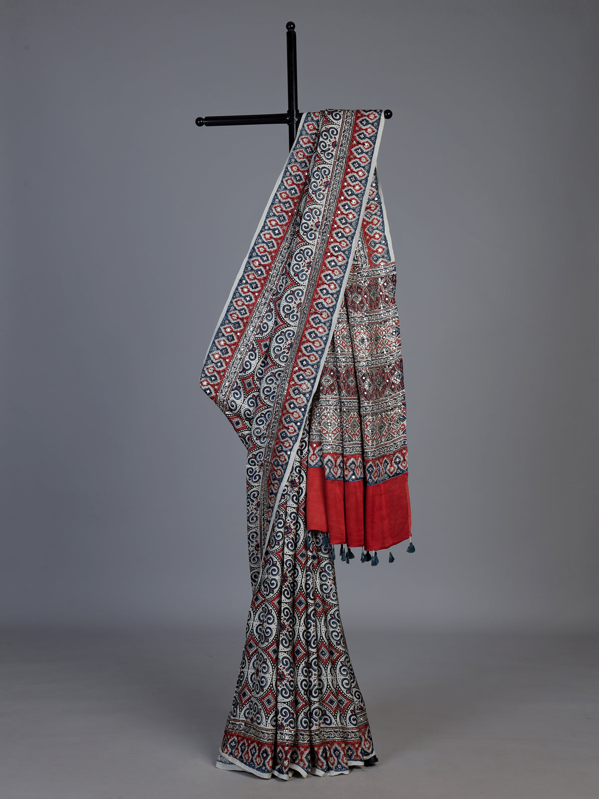 White crepe silk saree with delicate printed festive charm