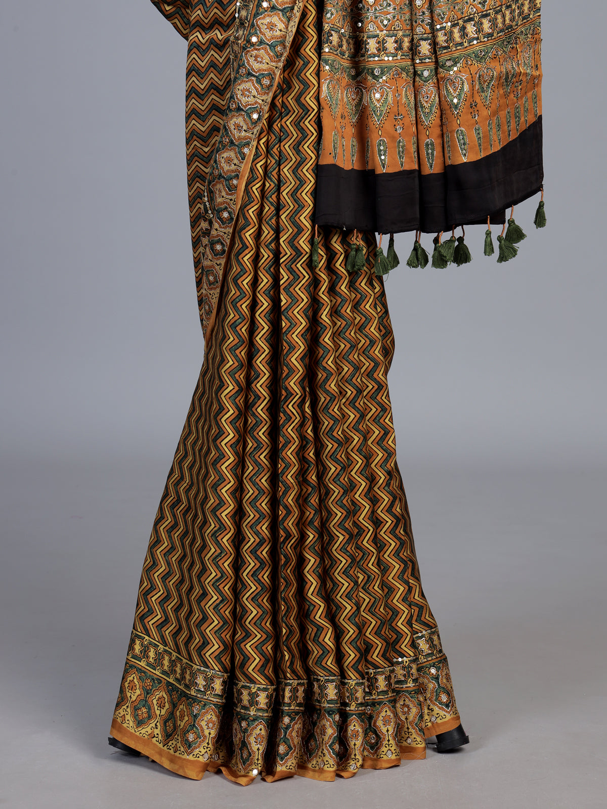 Mustard yellow crepe silk saree with zigzag printed elegance