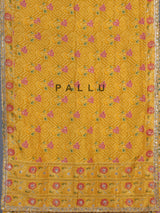Mustard yellow soft silk saree with bandhani floral contrast elegance