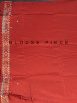 Rust orange soft silk saree with graceful ikat printed detailing
