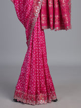 Rani pink soft silk saree with sparkling ikat printed elegance