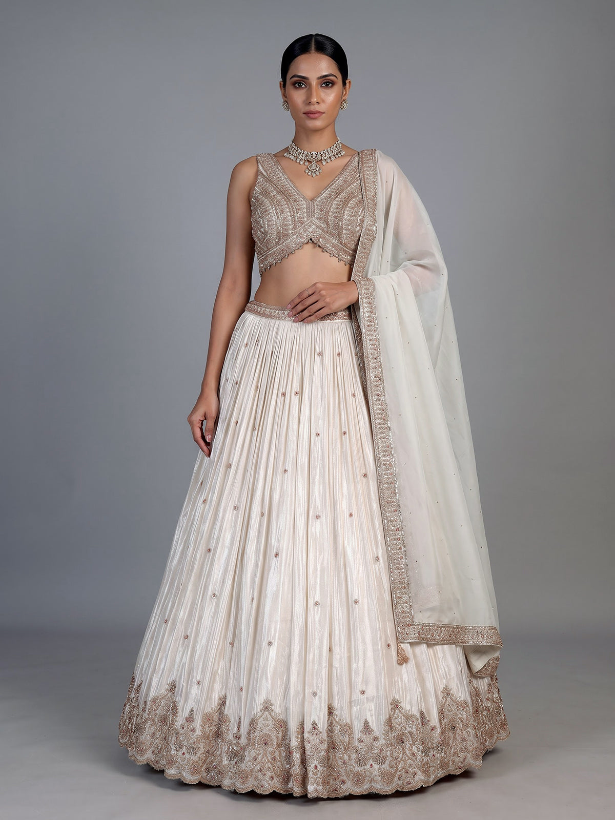 Cream silk embellished lehenga choli with elegant dupatta