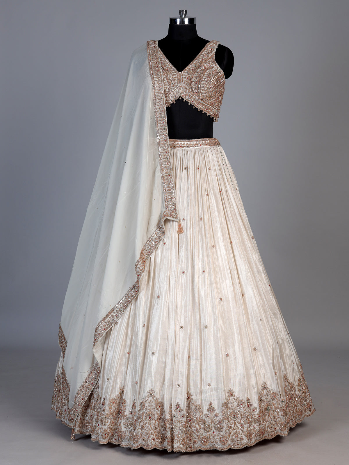 Cream silk embellished lehenga choli with elegant dupatta